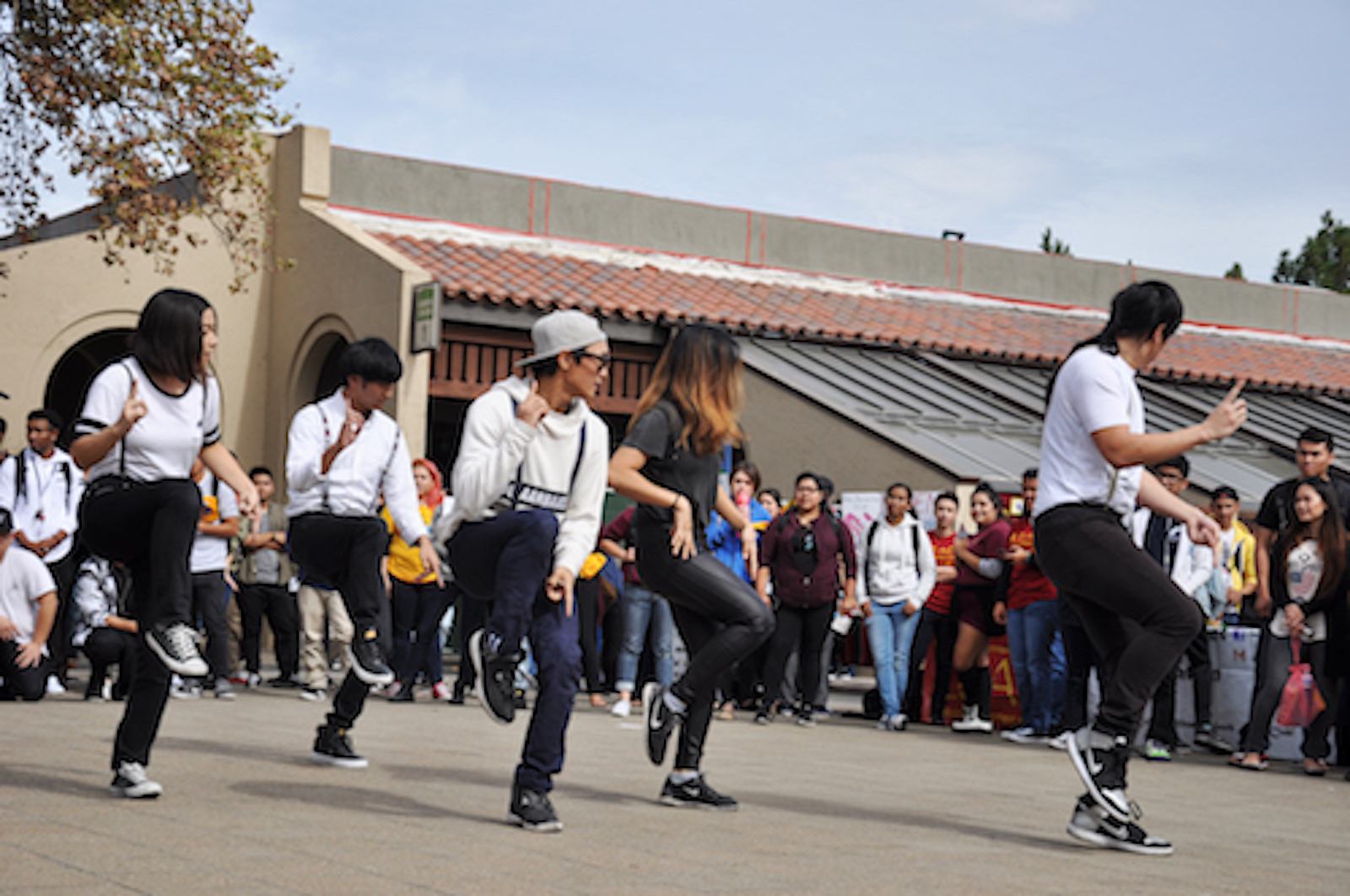 student dance group performing in main quad