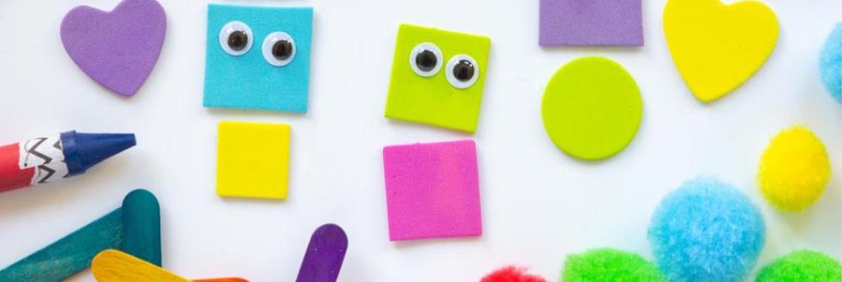 colorful felt squares and hearts, wooden sticks and crayon