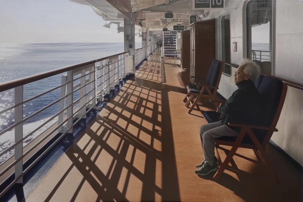 white-haired women on chair on ship's deck