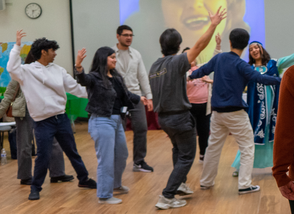 students dancing in circle
