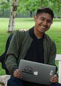 young man with laptop