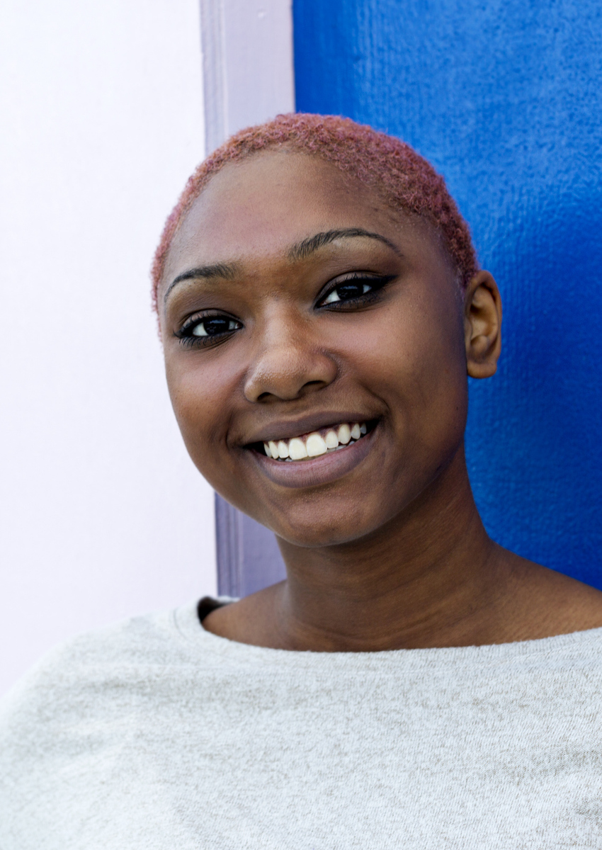 smiling young woman with short hair