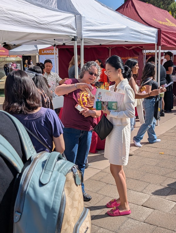 faculty member helping student