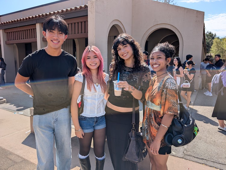 students smiling in line